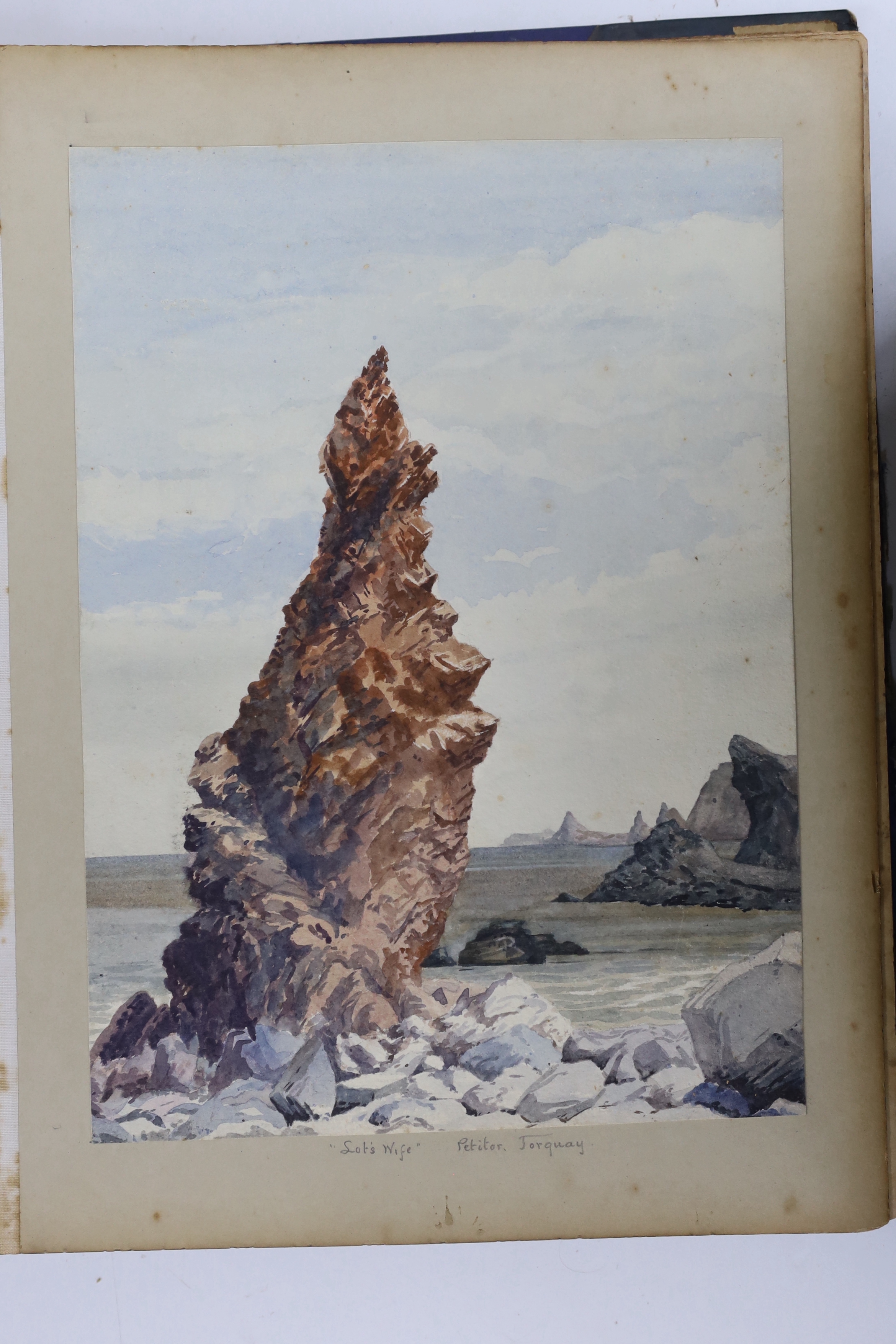 A late 19th / early 20th century album of watercolours and ink sketches, predominantly landscapes, including Torquay, Glasgow, table mountain, South Africa, Suez Canal and the Arabian coast, 36 x 30cm